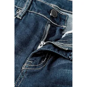 Close-up detail of women dark blue denim low-waist jeans zipper and metal button closure.