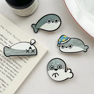 Detailed view of cute Sacabambaspis cartoon hair clips with various funny expressions