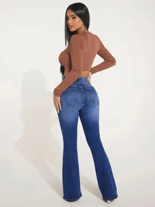 Detailed close-up view of women high waist flare denim jeans showcasing fit and wash.