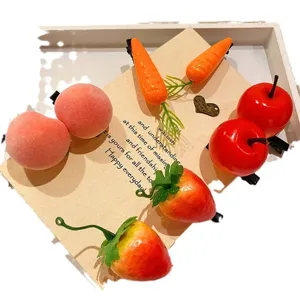 Adorable fruit and vegetable shaped hair clips set with carrot and strawberry motifs.