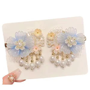 Elegante par de pinzas para el cabello de flores azules con borlas de perlas para Hanfu.