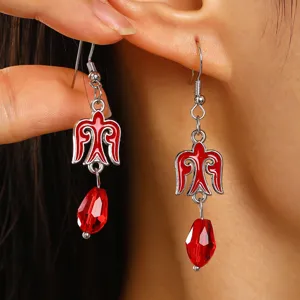 Kazakh style red drop earrings featuring an eagle motif and faceted crystal bead
