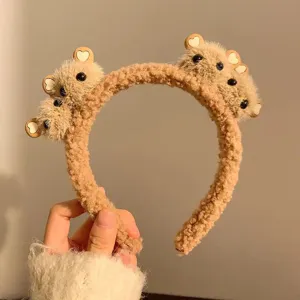 Cute plush bear headband in light brown, soft fuzzy material for autumn winter.