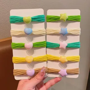 Set di elastici per capelli colorati per bambine con ciondoli a forma di cuore e stella