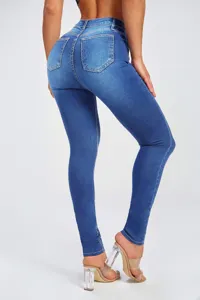 Detailed back view of high waisted stretch skinny jeans for women, slim fit denim trousers.