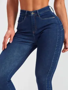 High-waisted stretch denim skinny jeans detail view, premium dark blue fabric finish.