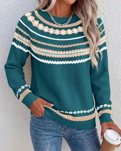 Close-up detail of women's long sleeve crewneck knit sweater with stylish patterned yoke.