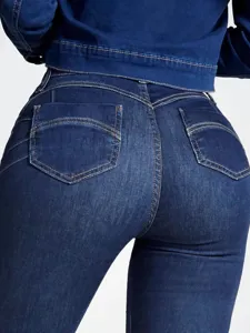 High-waisted stretch push-up skinny jeans for women, slim fit denim trousers with shaping detail.