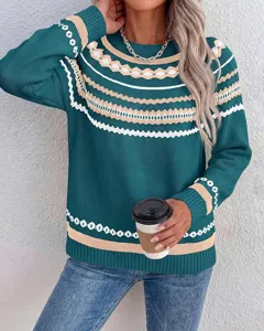 Close-up detail view of the stylish colorblock crewneck long sleeve knit sweater.