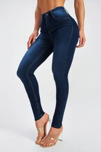 High-waisted dark blue skinny stretch denim jeans close-up, premium fabric details.