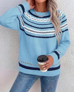 Detailed view of women's round neck colorblock long sleeve knit pullover sweater.