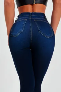 Back view of high waist skinny jeans women's fashion, stretchy denim trousers detail.