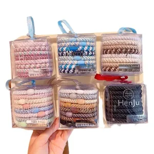 Set of high elasticity braided hair bands in various colors inside clear plastic packaging.