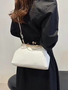 Elegant white retro woven leather crossbody handbag with rhinestone clasp on model