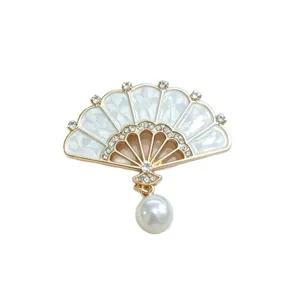 Elegant Chinese style fan brooch with white enamel, rhinestones and dangling pearl ornament