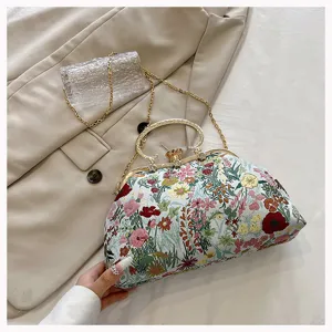 Elegant floral jacquard clutch handbag with vintage metal frame and gold chain strap for women