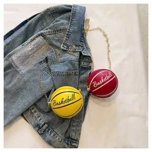 Creative basketball-shaped mini crossbody bags in red and yellow with gold chain straps
