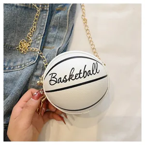 Detailed close-up of white basketball shaped mini round crossbody bag with gold chain