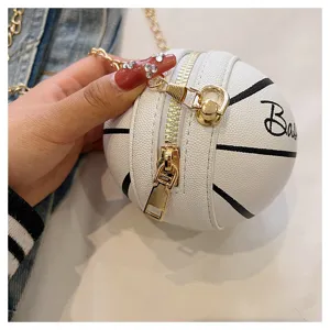 Close-up of white basketball-shaped PU leather mini bag with gold chain