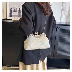 Elegante bolso de mano con bordado floral, cierre decorativo de perlas y cadena dorada
