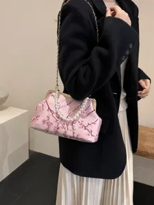 Elegante rosa bestickte Blumen-Abendtasche mit edlem Perlengriff und goldener Kette