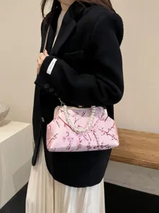 Elegante rosa bestickte Abendtasche mit Perlengriff und Kettenriemen für modische Damen