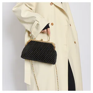 Elegante schwarze gestreifte Samt-Clutch mit goldener Rundgriff und Metallkette