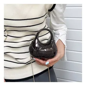 Geometric quilted hard shell handbag with acrylic finish and gold chain strap