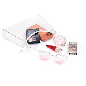 Detailed view of clear PVC jelly tote bag showing large capacity with everyday essentials