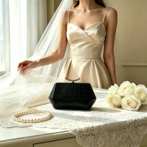 Professional close-up of a black crocodile texture hexagonal clutch bag in a wedding scene