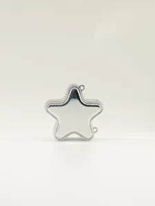 Silver star-shaped metallic acrylic small crossbody bag for women with chain loops.
