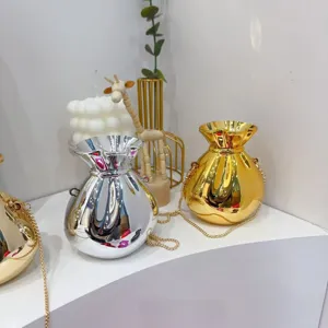 Elegant metallic lucky bag evening purses in gold and silver with stylish chain straps.