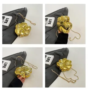 Detail 4-panel view showing a luxury gold flower-shaped acrylic evening clutch bag