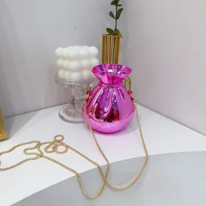 Luxury glossy pink fortune bag style evening clutch with delicate gold chain strap