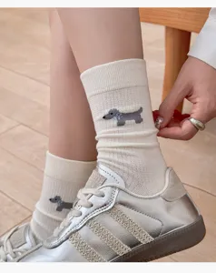 Cute dog embroidered cotton mid-calf socks for women, breathable spring hosiery.