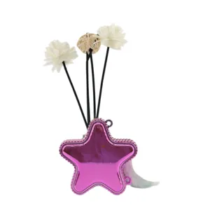 Shiny pink star-shaped acrylic mini crossbody bag with fuzzy tail accessory