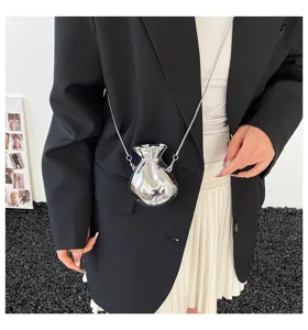 Elegant metallic silver fortune bag evening clutch with chain strap shown on model