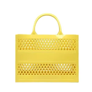 Yellow hollowed-out PVC large beach tote bag with top handle for travel and storage