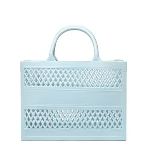 Light blue hollow PVC beach tote bag with large capacity for travel and shopping