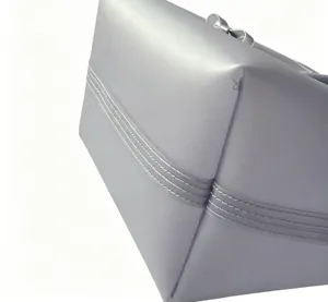 Detailed macro shot of the reinforced stitching on a grey TPU waterproof jelly bag