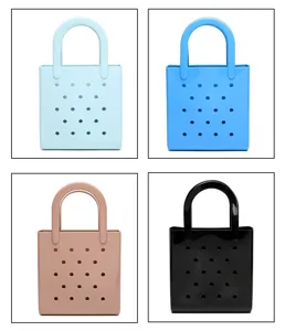Showcasing four color variations of waterproof PVC beach bags with perforated hole design