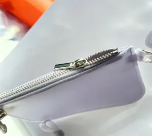 Macro view of silver zipper and smooth lavender TPU material on jelly tote