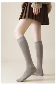Comfortable cotton solid color calf socks for women, stylish daily casual knee high hosiery.