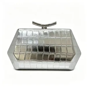 Elegant silver hexagonal evening clutch bag with crocodile texture and metallic finish