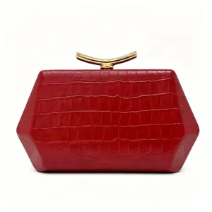 Front view of a red hexagonal evening clutch bag with elegant crocodile texture pattern.