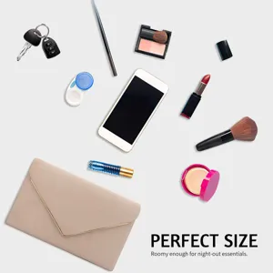 Minimalist beige evening clutch bag with gold metal trim showing night-out essentials
