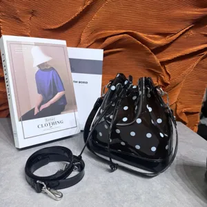 Black polka dot transparent jelly bucket bag with adjustable shoulder strap