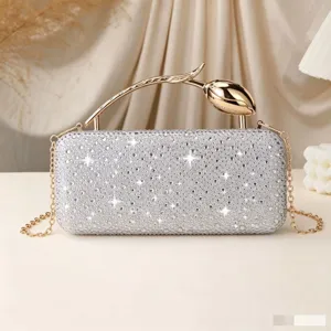 Elegant silver rhinestone evening clutch bag with gold tulip handle and chain strap
