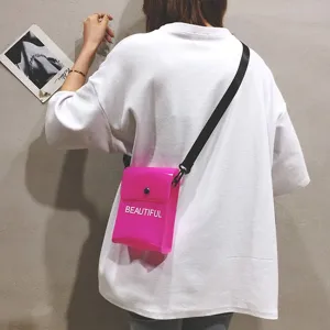 Neonpinke transparente PVC-Gelee-Umhängetasche für Damen mit 'BEAUTIFUL' Text