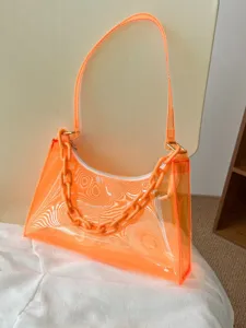 Vibrant neon orange transparent PVC jelly underarm bag with decorative plastic chain link.